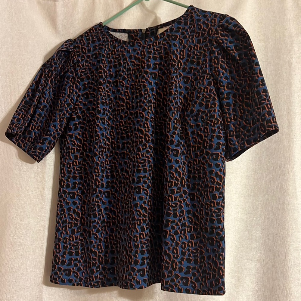 Funky blue, black, and orange leopard print shirt